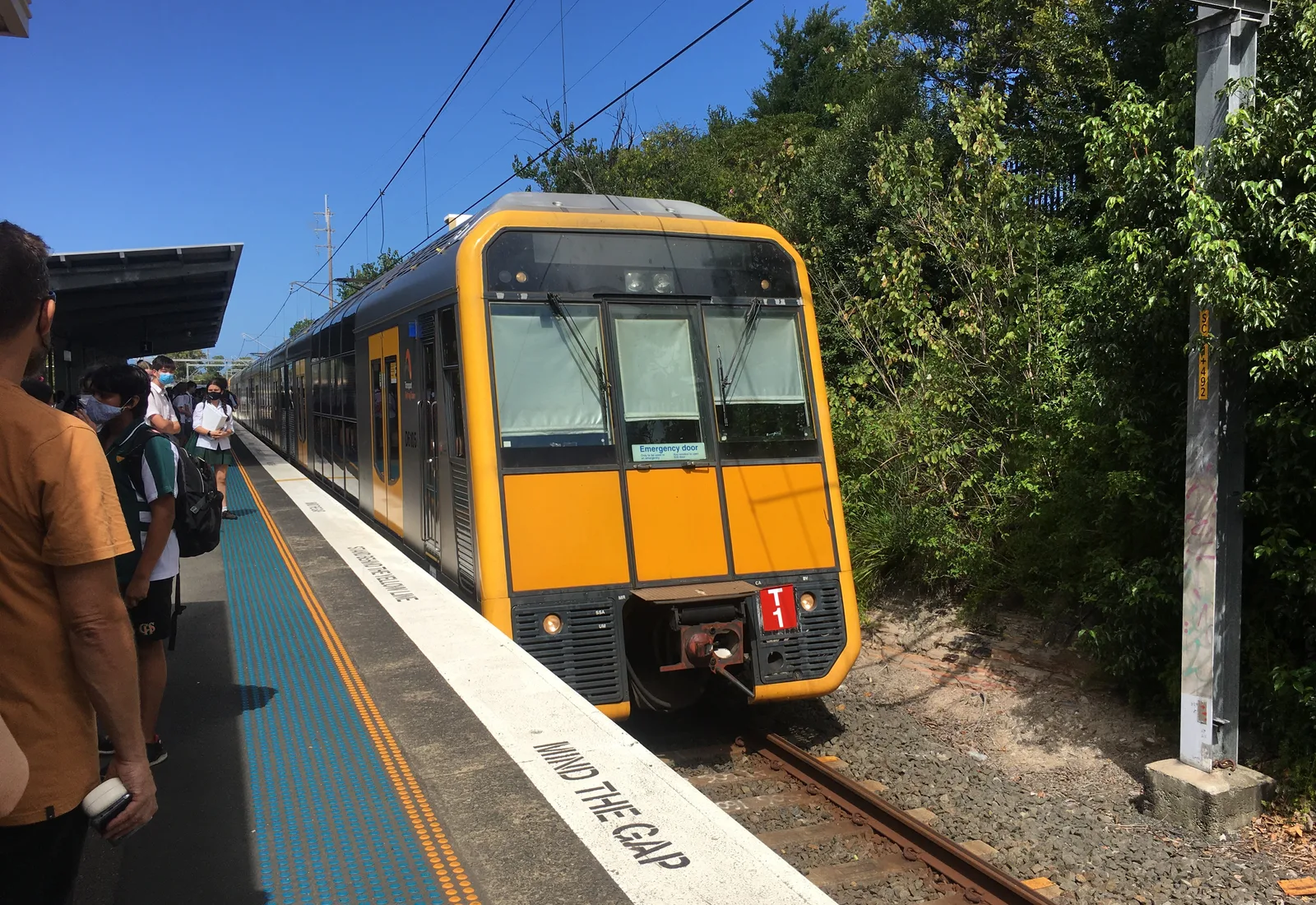 A train at Caringbah railway station on the Cronulla line, anchor of the Caringbah town centre near The Sutherland Hospital